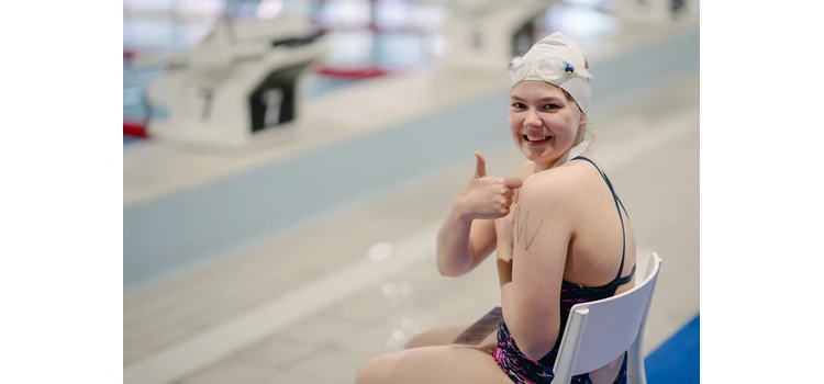 Startai plaukimo varžybose, kur atletai atiduoda visas jėgas įveikdami savo distancijas! 🏊‍♂️